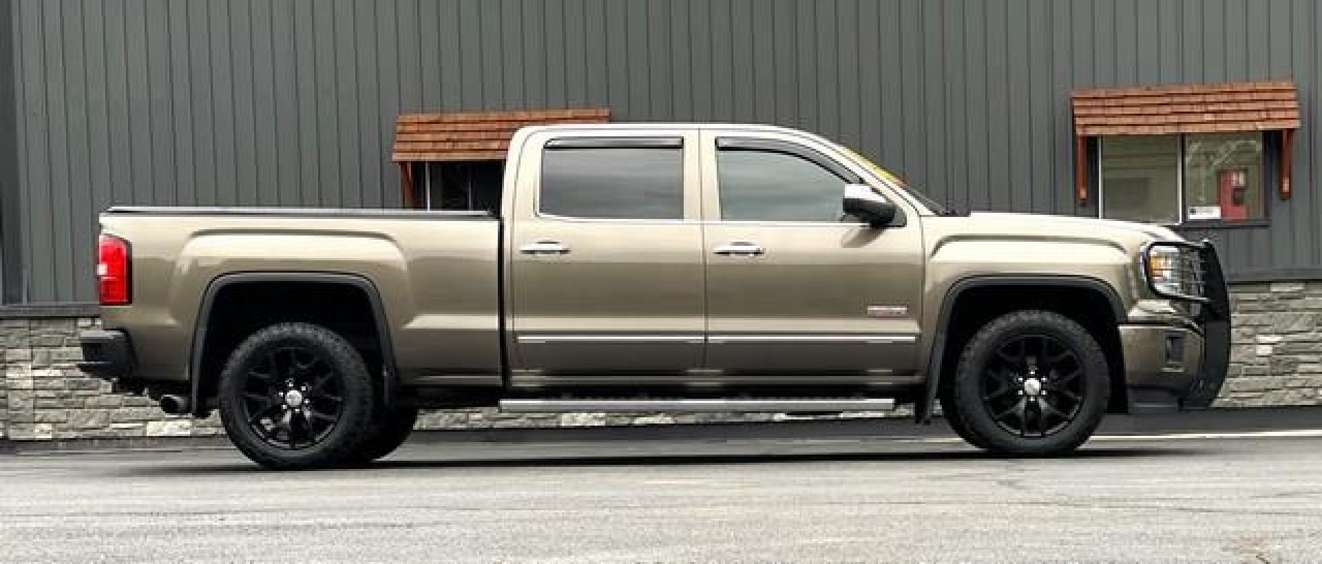 2015 BROWN GMC SIERRA 1500 (3GTU2UEC0FG) with an V8,5.3L(325 CID),OHV engine, AUTOMATIC transmission, located at 14600 Frazho Road, Warren, MI, 48089, (586) 776-3400, 42.485996, -82.974220 - Photo#6