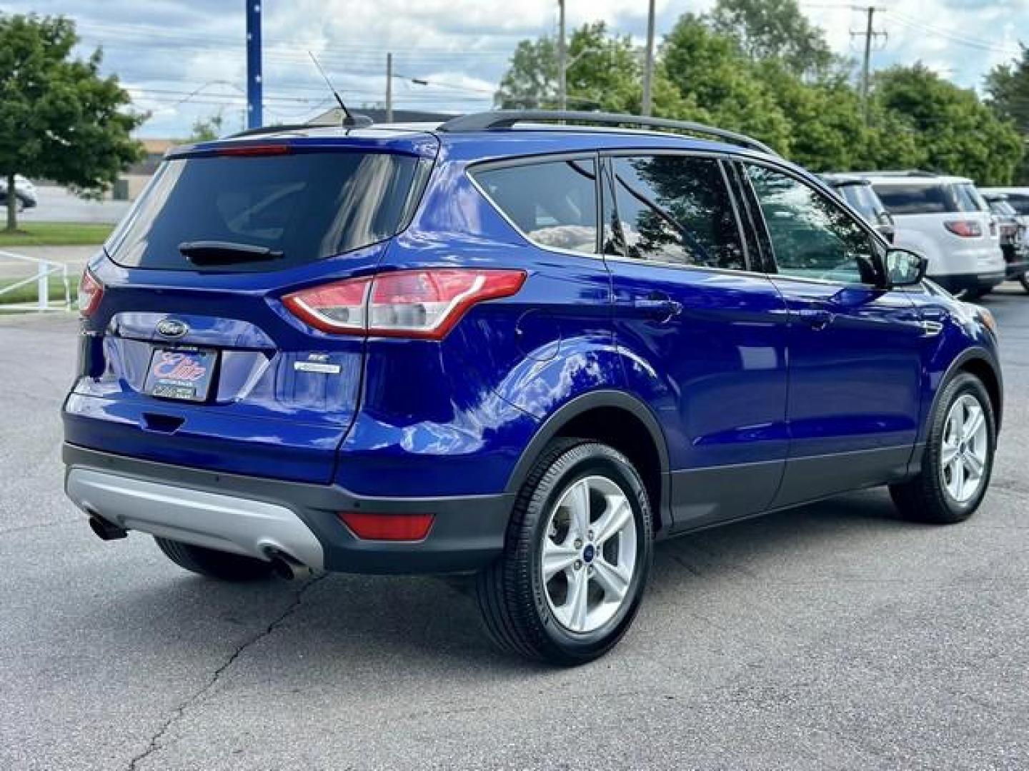 2015 BLUE FORD ESCAPE (1FMCU0GX0FU) with an L4,1.6L(97 CID),DOHC engine, AUTOMATIC transmission, located at 14600 Frazho Road, Warren, MI, 48089, (586) 776-3400, 42.485996, -82.974220 - Photo#4