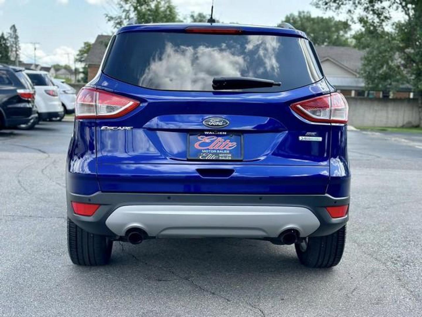 2015 BLUE FORD ESCAPE (1FMCU0GX0FU) with an L4,1.6L(97 CID),DOHC engine, AUTOMATIC transmission, located at 14600 Frazho Road, Warren, MI, 48089, (586) 776-3400, 42.485996, -82.974220 - Photo#5