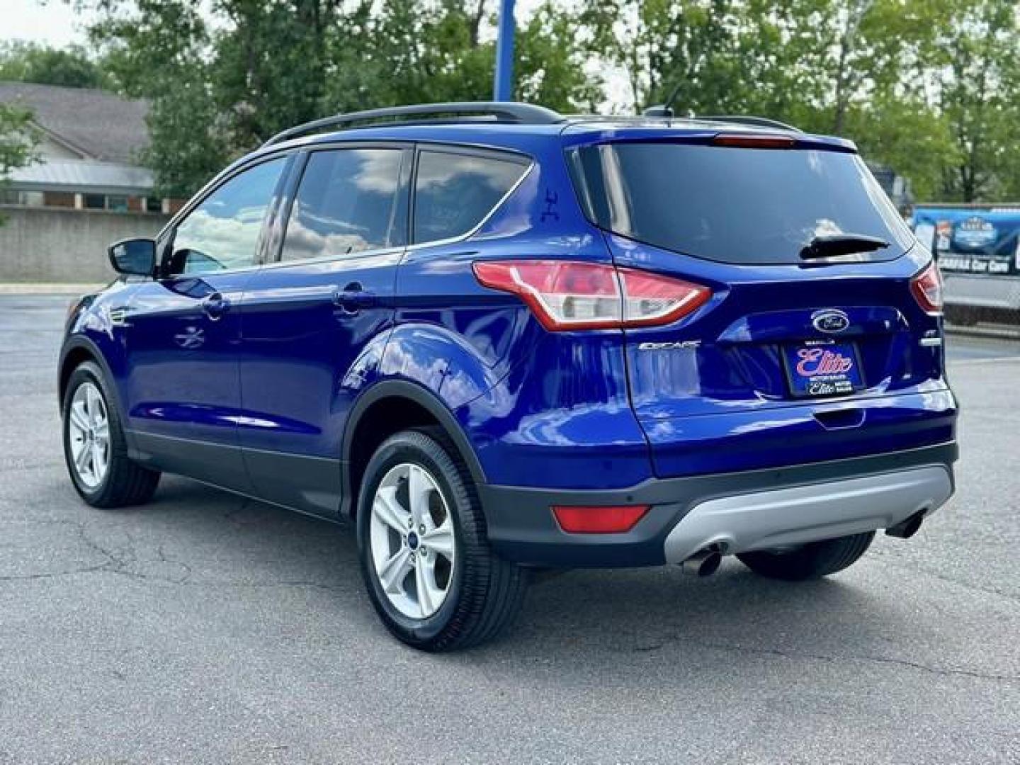 2015 BLUE FORD ESCAPE (1FMCU0GX0FU) with an L4,1.6L(97 CID),DOHC engine, AUTOMATIC transmission, located at 14600 Frazho Road, Warren, MI, 48089, (586) 776-3400, 42.485996, -82.974220 - Photo#6