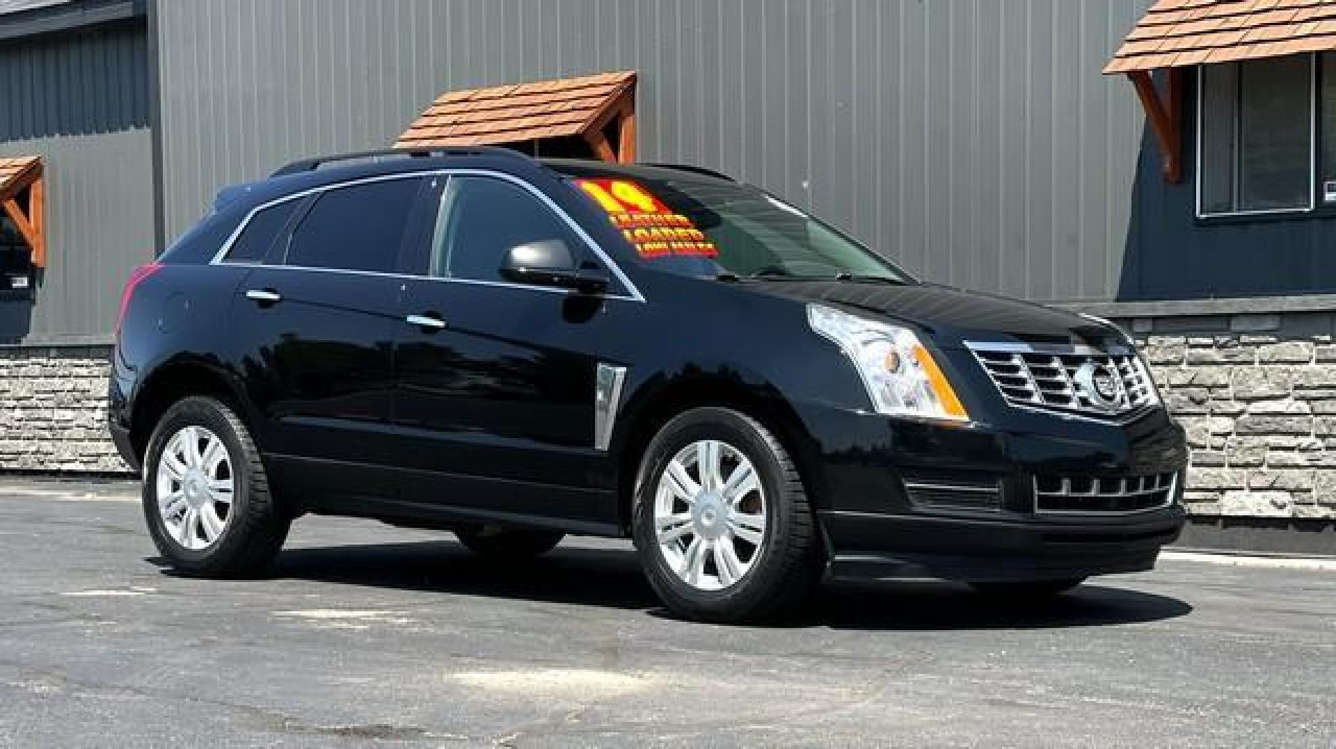 2014 BLACK CADILLAC SRX (3GYFNAE31ES) with an V6,3.6L(217 CID),DOHC engine, AUTOMATIC transmission, located at 14600 Frazho Road, Warren, MI, 48089, (586) 776-3400, 42.485996, -82.974220 - Photo#4