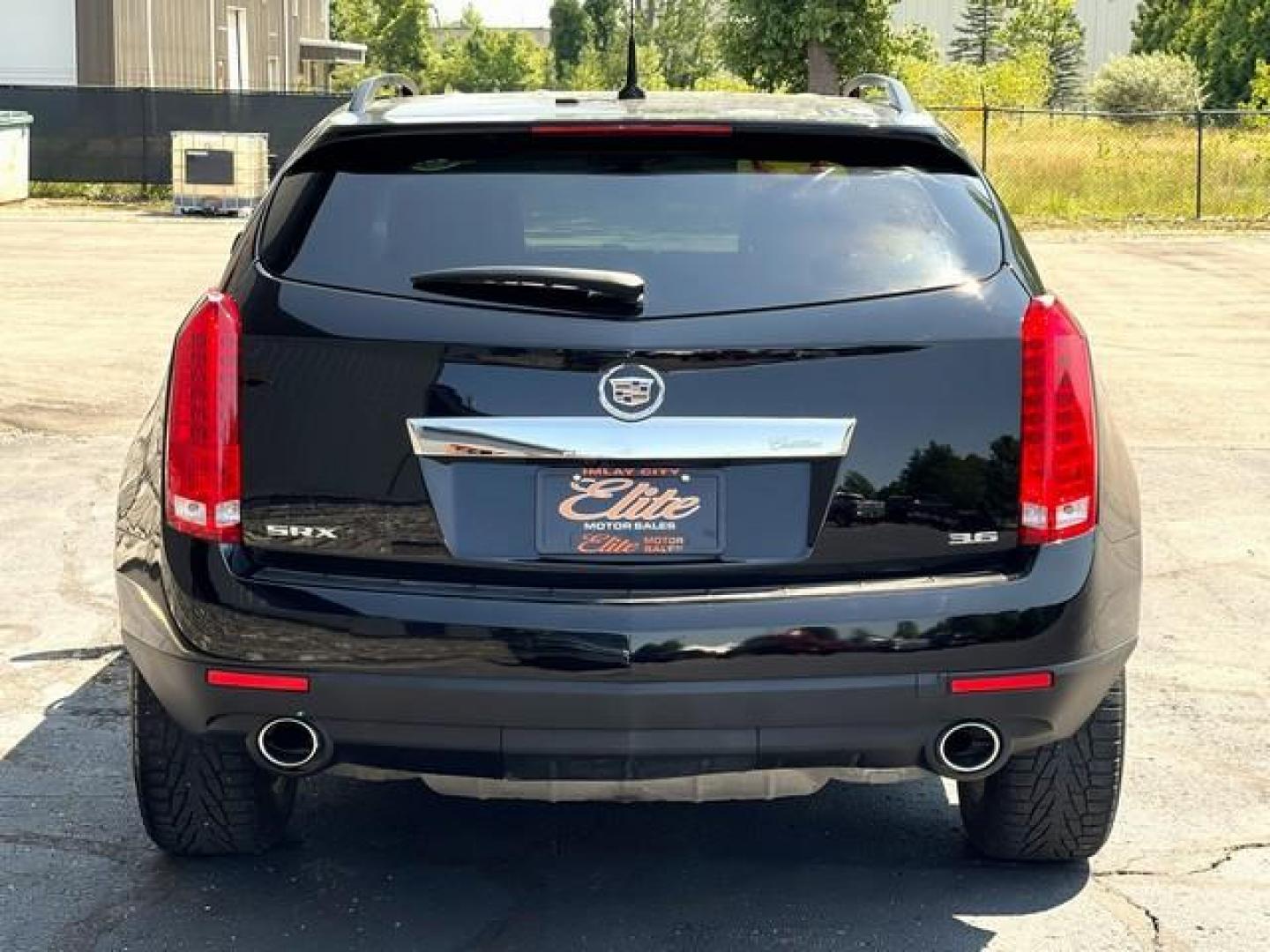 2014 BLACK CADILLAC SRX (3GYFNAE31ES) with an V6,3.6L(217 CID),DOHC engine, AUTOMATIC transmission, located at 14600 Frazho Road, Warren, MI, 48089, (586) 776-3400, 42.485996, -82.974220 - Photo#6