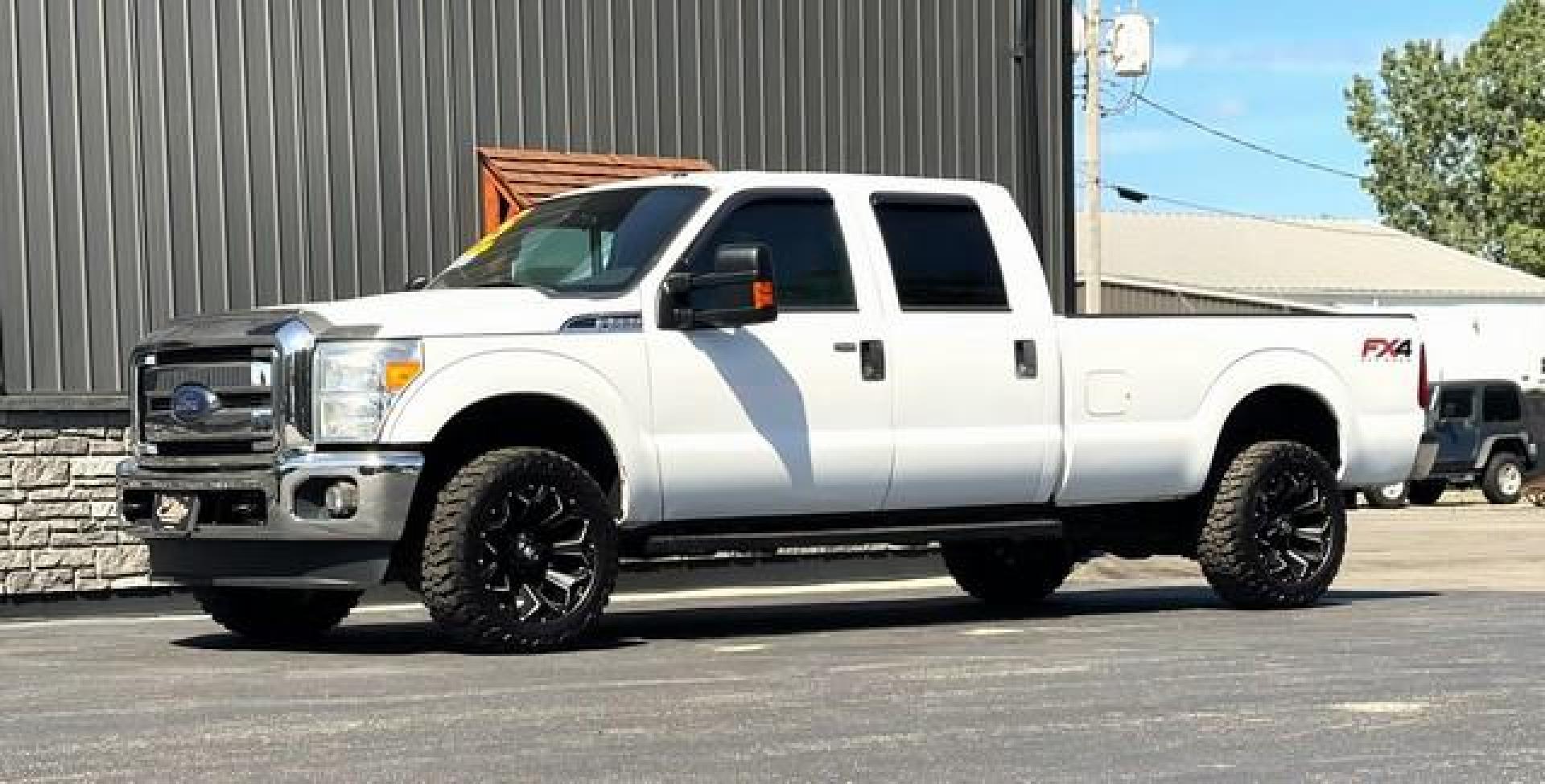 2015 WHITE FORD F-350 SUPER DUTY (1FT8W3B66FE) with an V8,6.2L(379 CID),SOHC engine, AUTOMATIC transmission, located at 14600 Frazho Road, Warren, MI, 48089, (586) 776-3400, 42.485996, -82.974220 - Photo#2