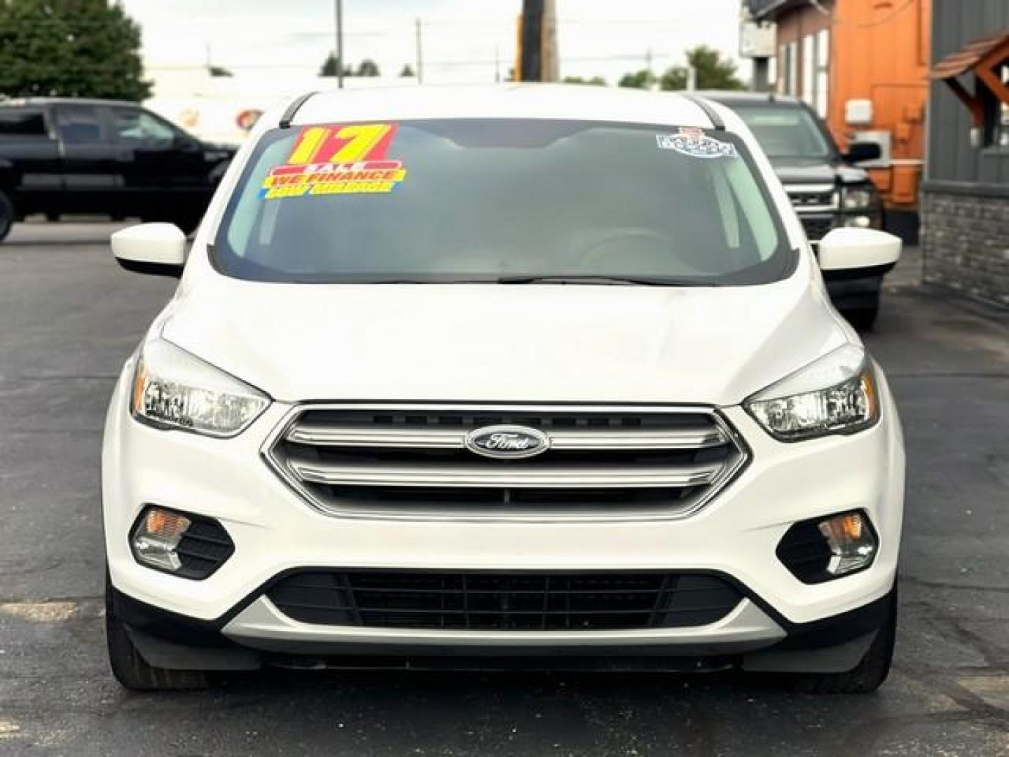 2017 WHITE FORD ESCAPE (1FMCU0GD1HU) with an L4,1.5L(91 CID),DOHC engine, AUTOMATIC transmission, located at 14600 Frazho Road, Warren, MI, 48089, (586) 776-3400, 42.485996, -82.974220 - Photo#1