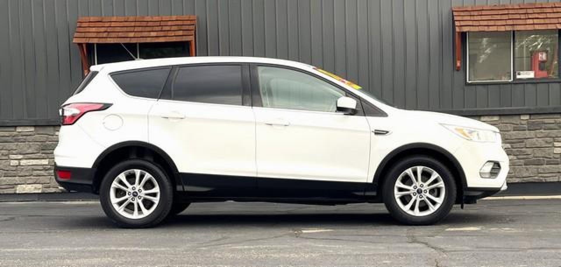 2017 WHITE FORD ESCAPE (1FMCU0GD1HU) with an L4,1.5L(91 CID),DOHC engine, AUTOMATIC transmission, located at 14600 Frazho Road, Warren, MI, 48089, (586) 776-3400, 42.485996, -82.974220 - Photo#3