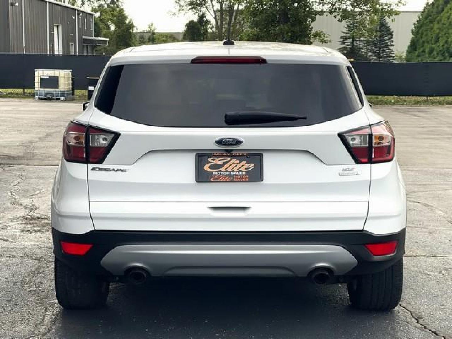 2017 WHITE FORD ESCAPE (1FMCU0GD1HU) with an L4,1.5L(91 CID),DOHC engine, AUTOMATIC transmission, located at 14600 Frazho Road, Warren, MI, 48089, (586) 776-3400, 42.485996, -82.974220 - Photo#4