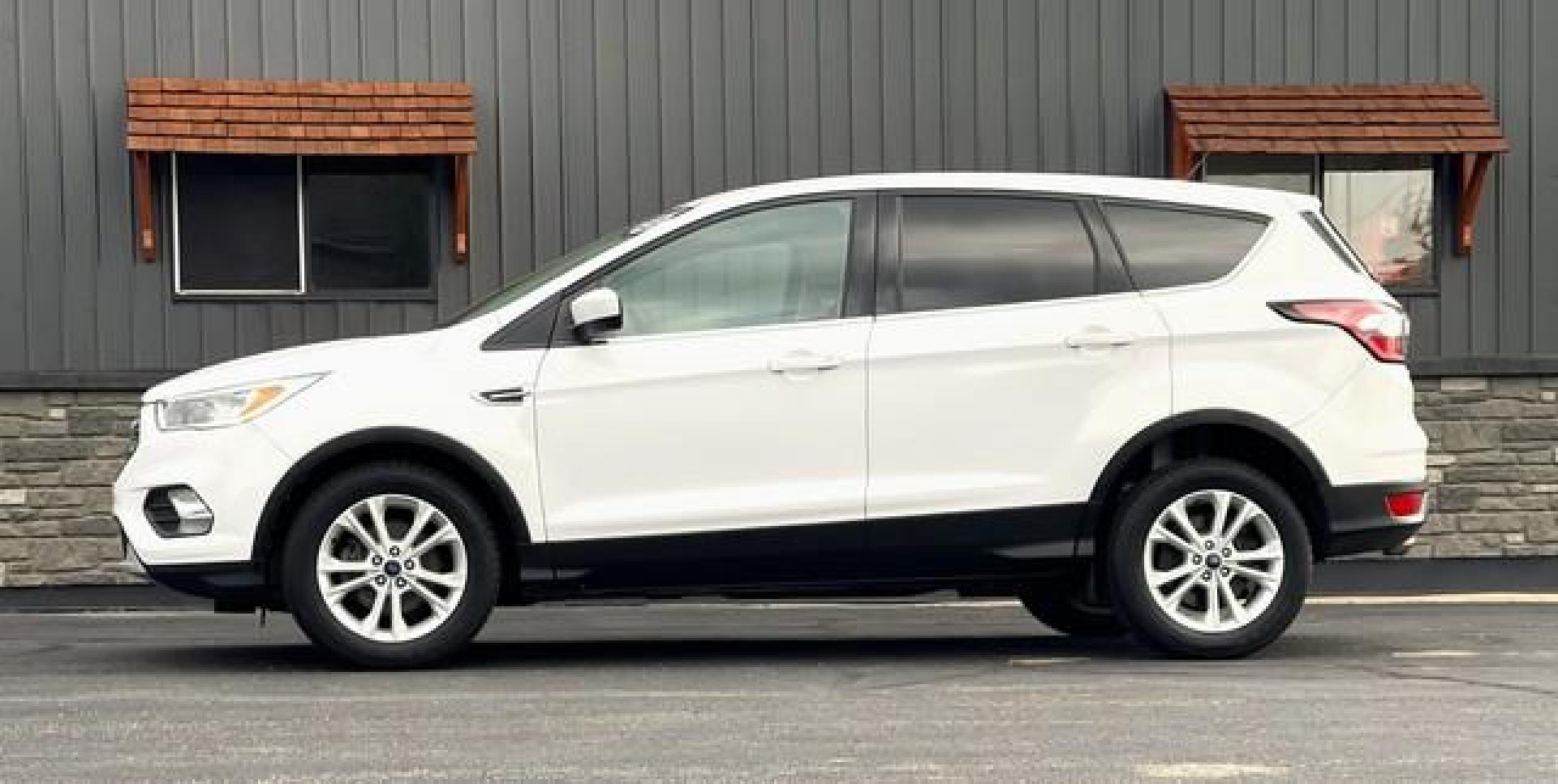 2017 WHITE FORD ESCAPE (1FMCU0GD1HU) with an L4,1.5L(91 CID),DOHC engine, AUTOMATIC transmission, located at 14600 Frazho Road, Warren, MI, 48089, (586) 776-3400, 42.485996, -82.974220 - Photo#6