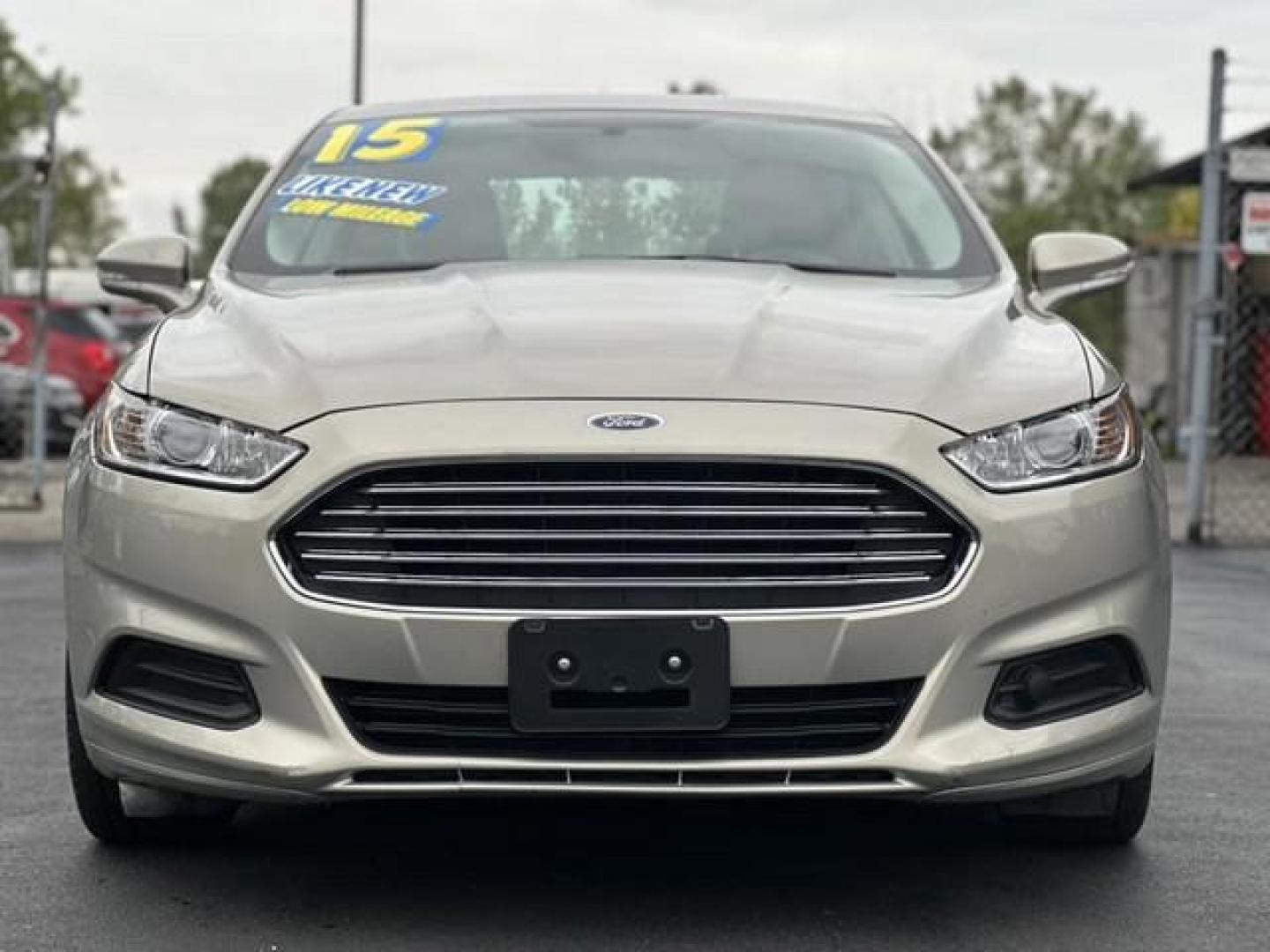 2015 TAN FORD FUSION (3FA6P0HD3FR) with an L4,1.5L(91 CID),DOHC engine, AUTOMATIC transmission, located at 14600 Frazho Road, Warren, MI, 48089, (586) 776-3400, 42.485996, -82.974220 - Photo#1