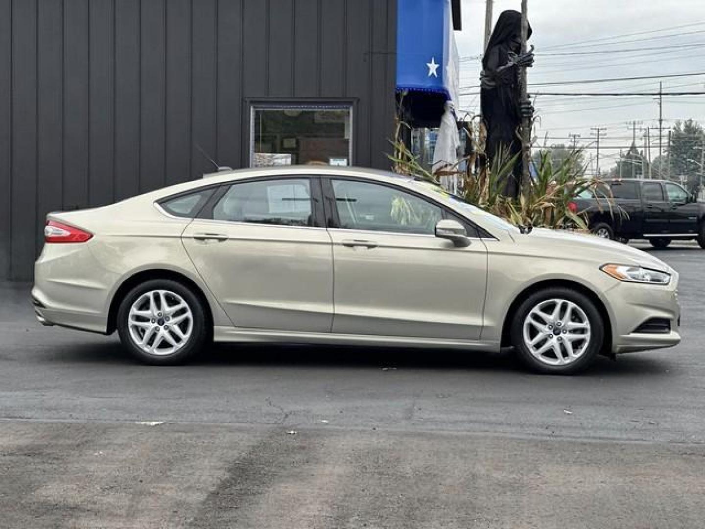 2015 TAN FORD FUSION (3FA6P0HD3FR) with an L4,1.5L(91 CID),DOHC engine, AUTOMATIC transmission, located at 14600 Frazho Road, Warren, MI, 48089, (586) 776-3400, 42.485996, -82.974220 - Photo#3