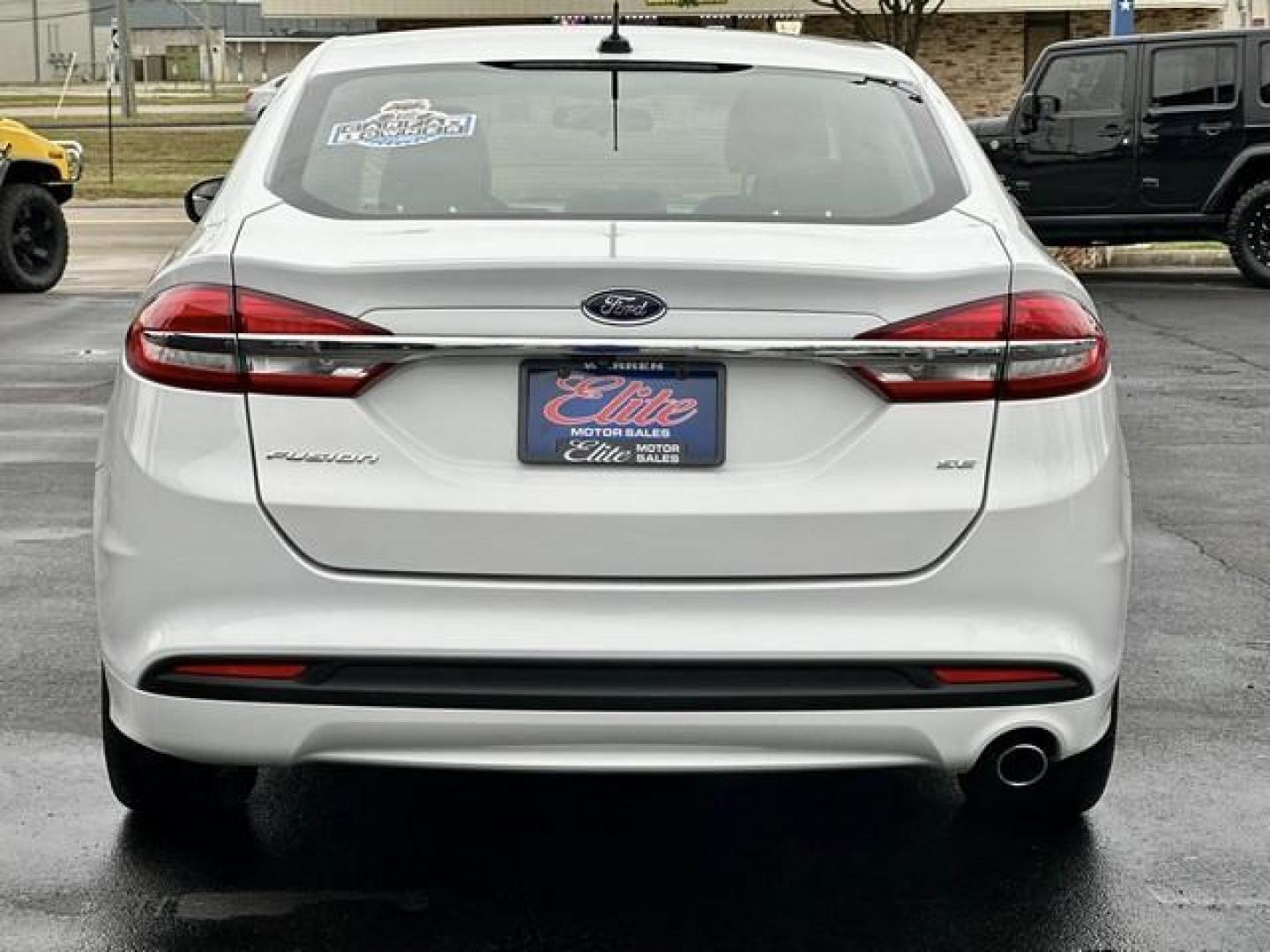 2017 WHITE FORD FUSION (3FA6P0H76HR) with an L4,2.5L(152 CID),DOHC engine, AUTOMATIC transmission, located at 14600 Frazho Road, Warren, MI, 48089, (586) 776-3400, 42.485996, -82.974220 - Photo#5