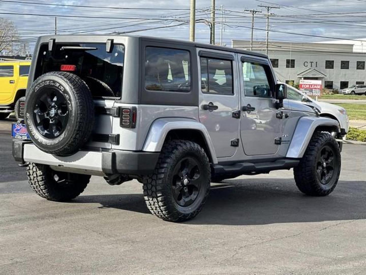 2016 GRAY JEEP WRANGLER (1C4BJWEG1GL) with an V6,3.6L(220 CID),DOHC engine, AUTOMATIC transmission, located at 14600 Frazho Road, Warren, MI, 48089, (586) 776-3400, 42.485996, -82.974220 - Photo#6