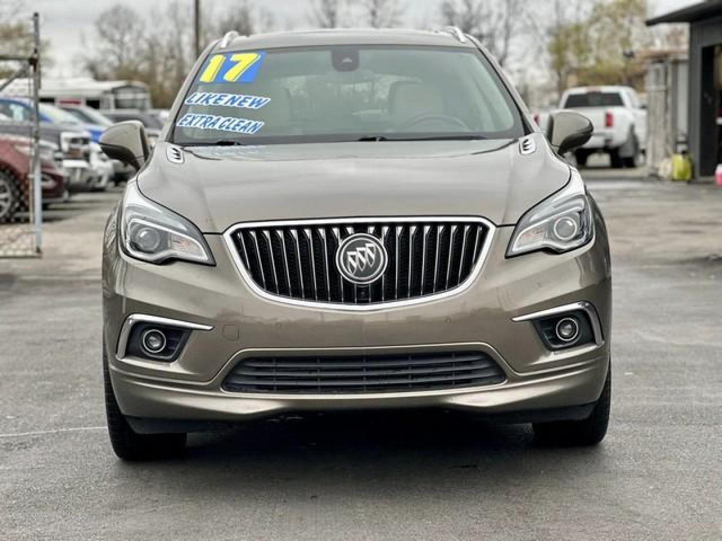 2017 BROWN BUICK ENVISION (LRBFXFSX6HD) with an L4,2.0L(122 CID),DOHC engine, AUTOMATIC transmission, located at 14600 Frazho Road, Warren, MI, 48089, (586) 776-3400, 42.485996, -82.974220 - Photo#1