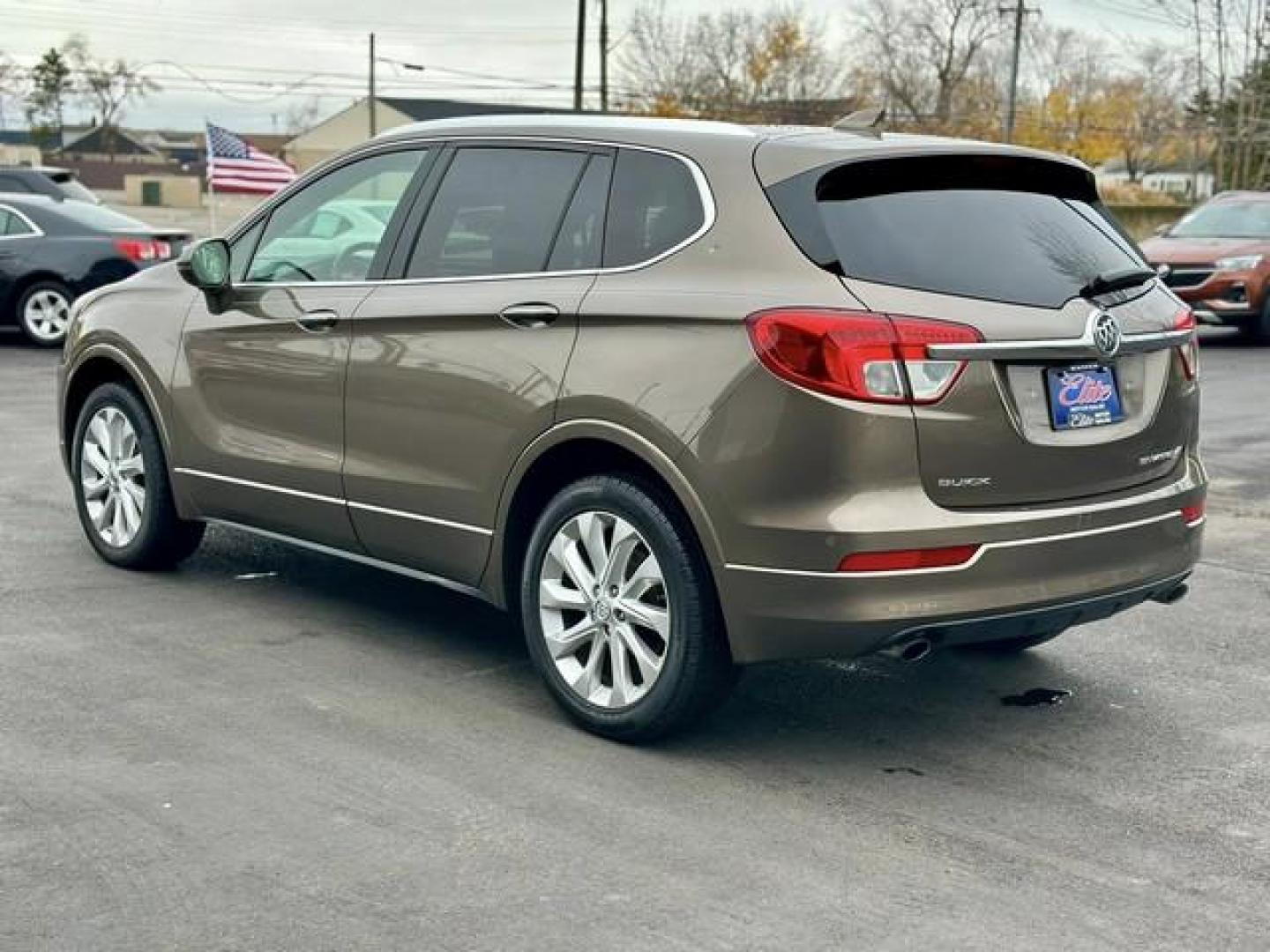 2017 BROWN BUICK ENVISION (LRBFXFSX6HD) with an L4,2.0L(122 CID),DOHC engine, AUTOMATIC transmission, located at 14600 Frazho Road, Warren, MI, 48089, (586) 776-3400, 42.485996, -82.974220 - Photo#6