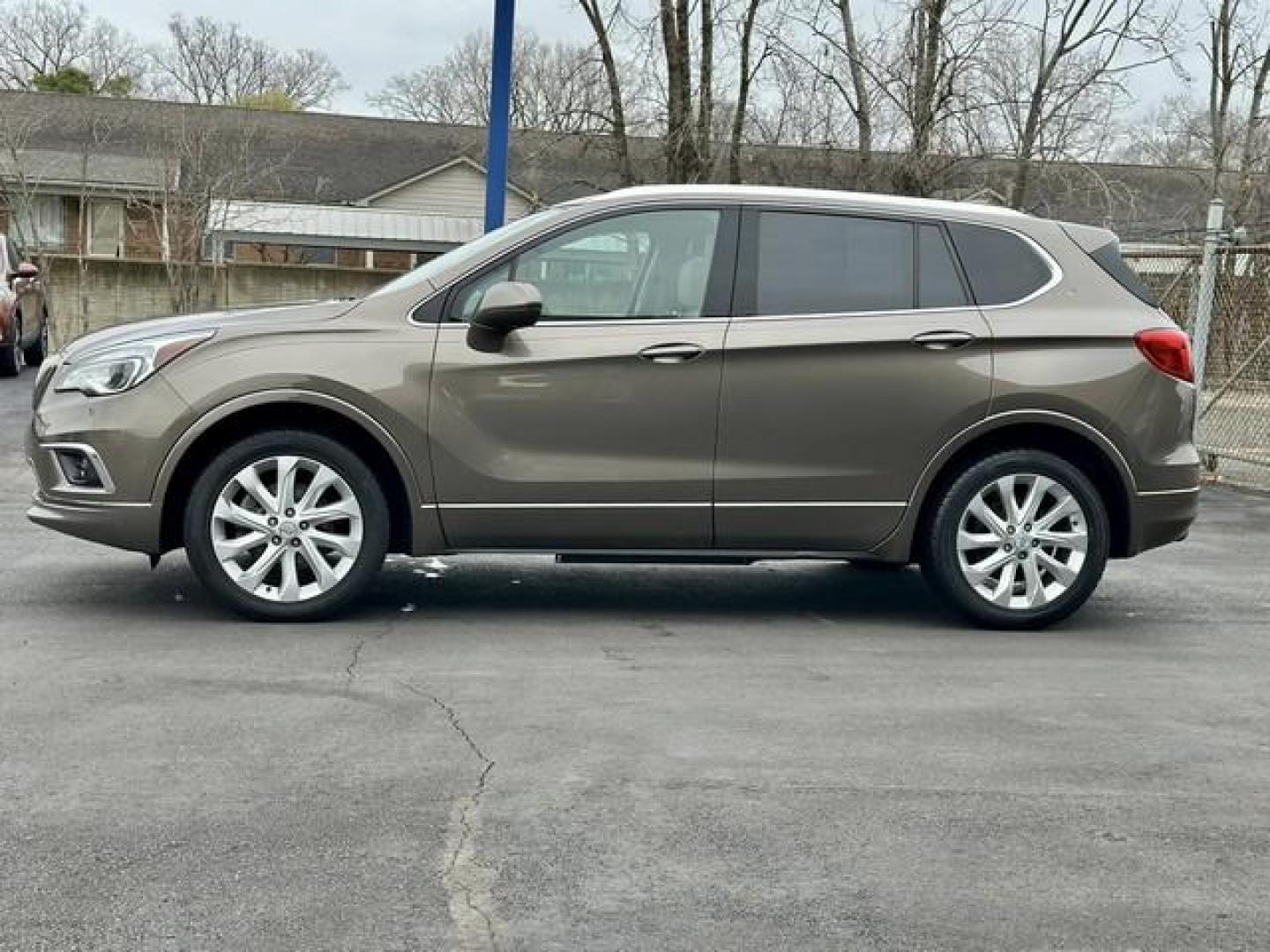 2017 BROWN BUICK ENVISION (LRBFXFSX6HD) with an L4,2.0L(122 CID),DOHC engine, AUTOMATIC transmission, located at 14600 Frazho Road, Warren, MI, 48089, (586) 776-3400, 42.485996, -82.974220 - Photo#7