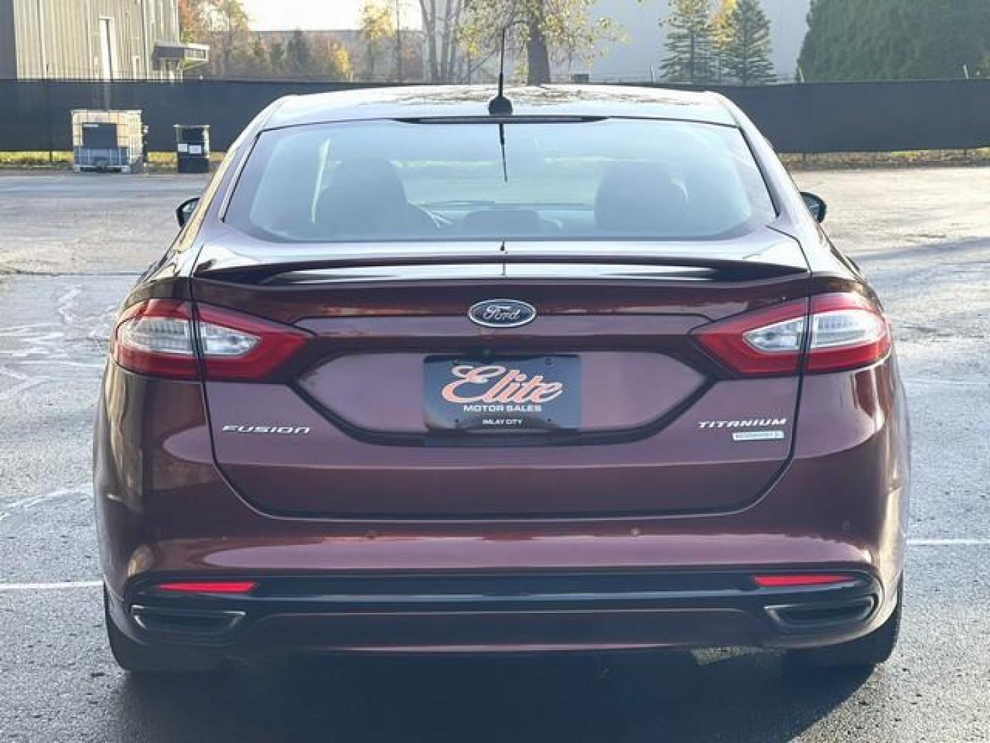 2015 BURGUNDY FORD FUSION (3FA6P0K95FR) with an L4,2.0L(122 CID),DOHC engine, AUTOMATIC transmission, located at 14600 Frazho Road, Warren, MI, 48089, (586) 776-3400, 42.485996, -82.974220 - Photo#6