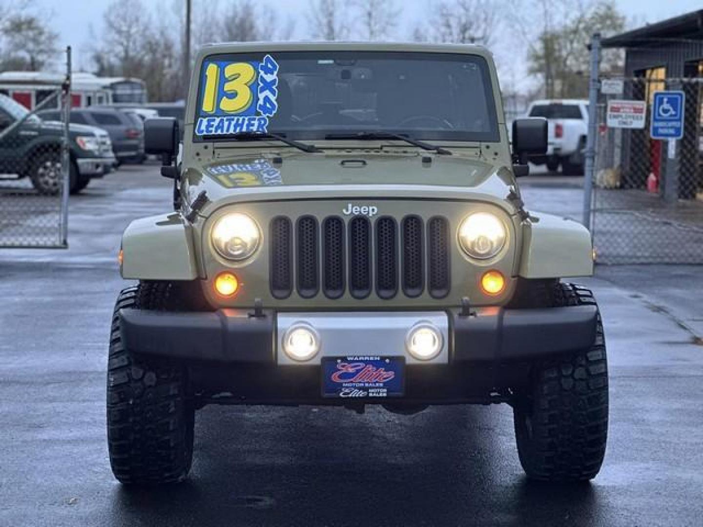 2013 GREEN JEEP WRANGLER (1C4BJWEGXDL) with an V6,3.6L(220 CID),DOHC engine, AUTOMATIC transmission, located at 14600 Frazho Road, Warren, MI, 48089, (586) 776-3400, 42.485996, -82.974220 - Photo#1