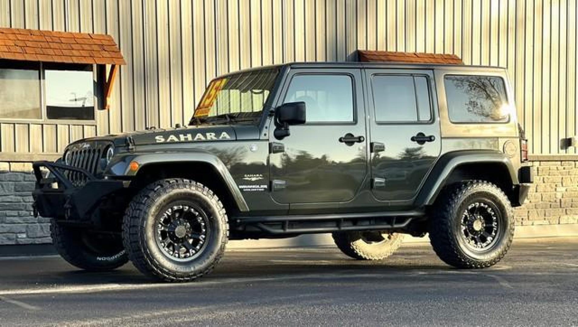 2015 GREEN JEEP WRANGLER (1C4BJWEG4FL) with an V6,3.6L(220 CID),DOHC engine, AUTOMATIC transmission, located at 14600 Frazho Road, Warren, MI, 48089, (586) 776-3400, 42.485996, -82.974220 - Photo#2