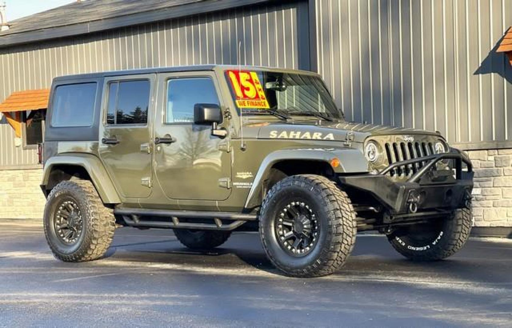 2015 GREEN JEEP WRANGLER (1C4BJWEG4FL) with an V6,3.6L(220 CID),DOHC engine, AUTOMATIC transmission, located at 14600 Frazho Road, Warren, MI, 48089, (586) 776-3400, 42.485996, -82.974220 - Photo#4