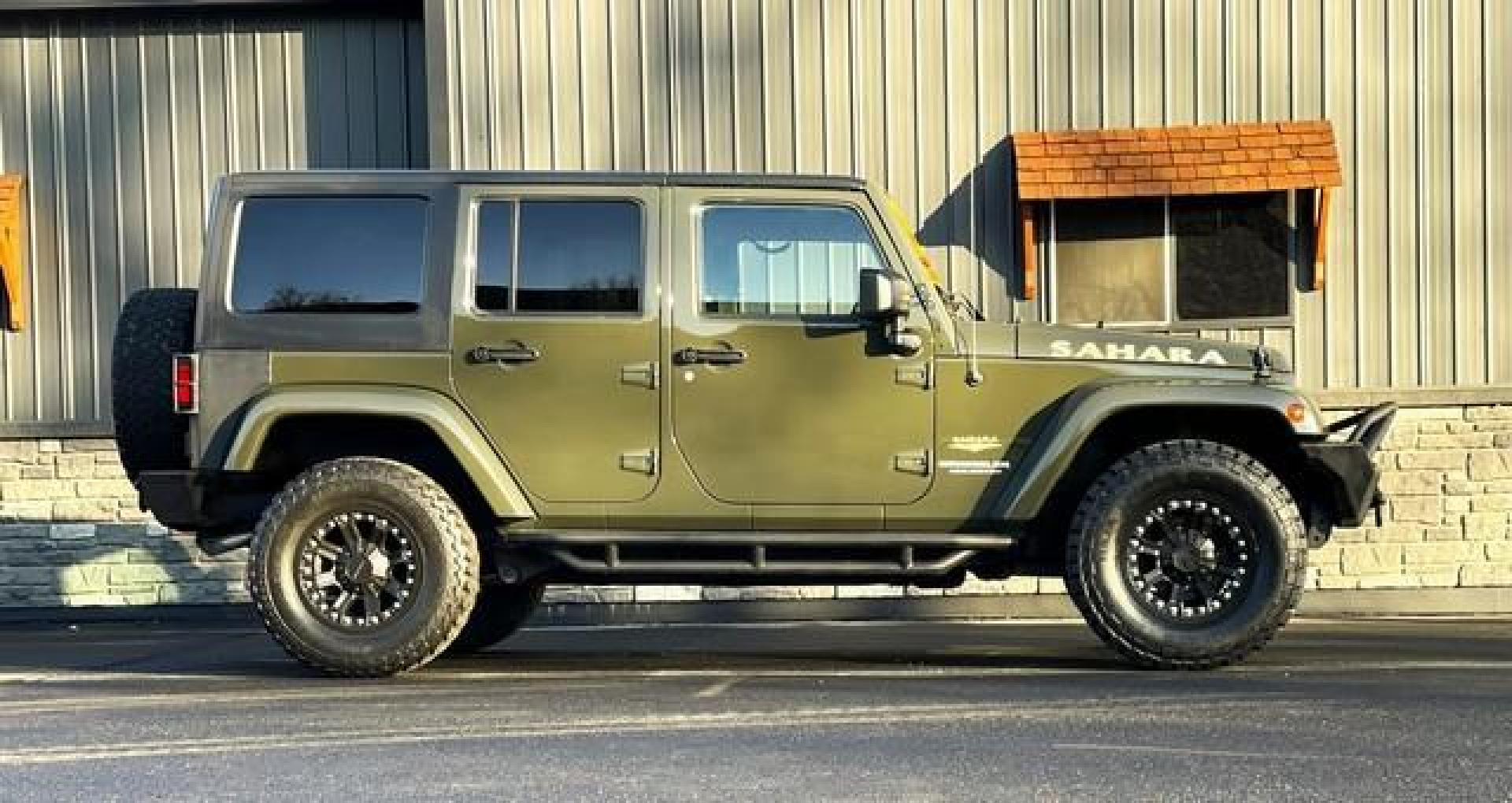 2015 GREEN JEEP WRANGLER (1C4BJWEG4FL) with an V6,3.6L(220 CID),DOHC engine, AUTOMATIC transmission, located at 14600 Frazho Road, Warren, MI, 48089, (586) 776-3400, 42.485996, -82.974220 - Photo#5