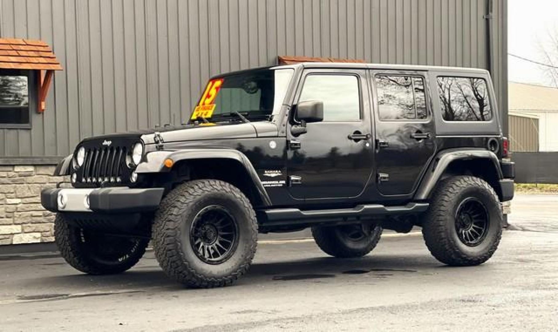 2015 BLACK JEEP WRANGLER (1C4BJWEG9FL) with an V6,3.6L(220 CID),DOHC engine, AUTOMATIC transmission, located at 14600 Frazho Road, Warren, MI, 48089, (586) 776-3400, 42.485996, -82.974220 - Photo#1