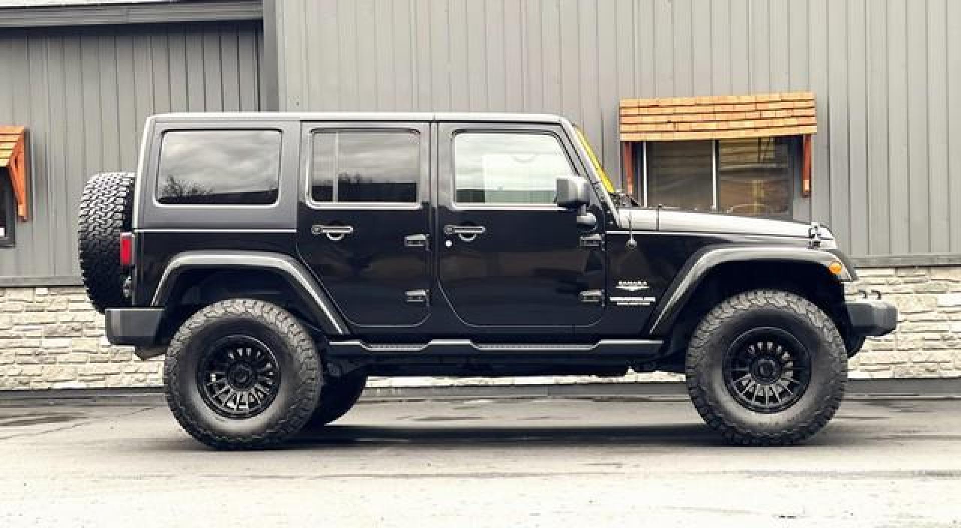 2015 BLACK JEEP WRANGLER (1C4BJWEG9FL) with an V6,3.6L(220 CID),DOHC engine, AUTOMATIC transmission, located at 14600 Frazho Road, Warren, MI, 48089, (586) 776-3400, 42.485996, -82.974220 - Photo#2