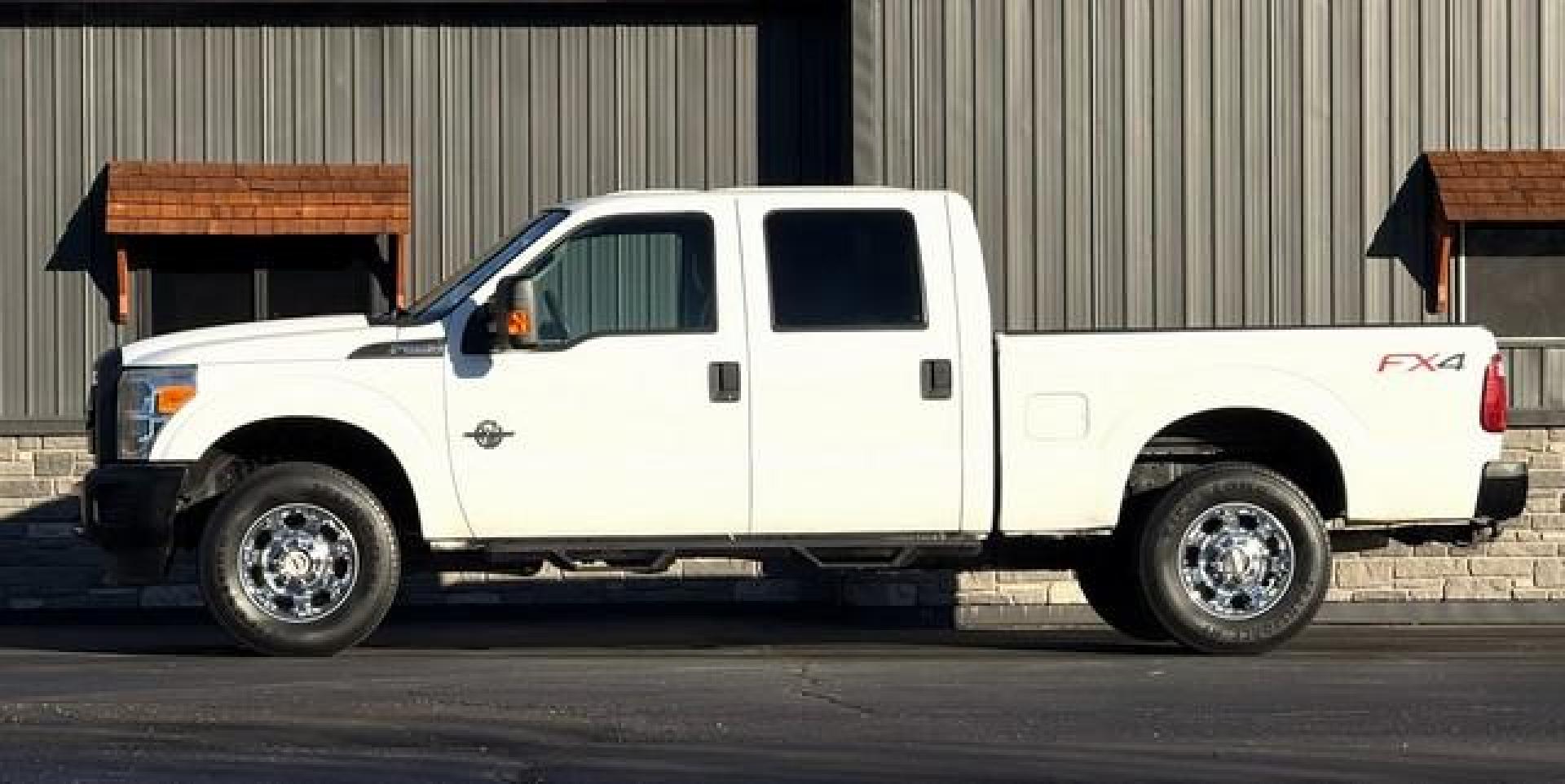 2014 WHITE FORD F-250 SUPER DUTY (1FT7W2BT7EE) with an V8,6.7L(406 CID),OHV engine, AUTOMATIC transmission, located at 14600 Frazho Road, Warren, MI, 48089, (586) 776-3400, 42.485996, -82.974220 - Photo#5