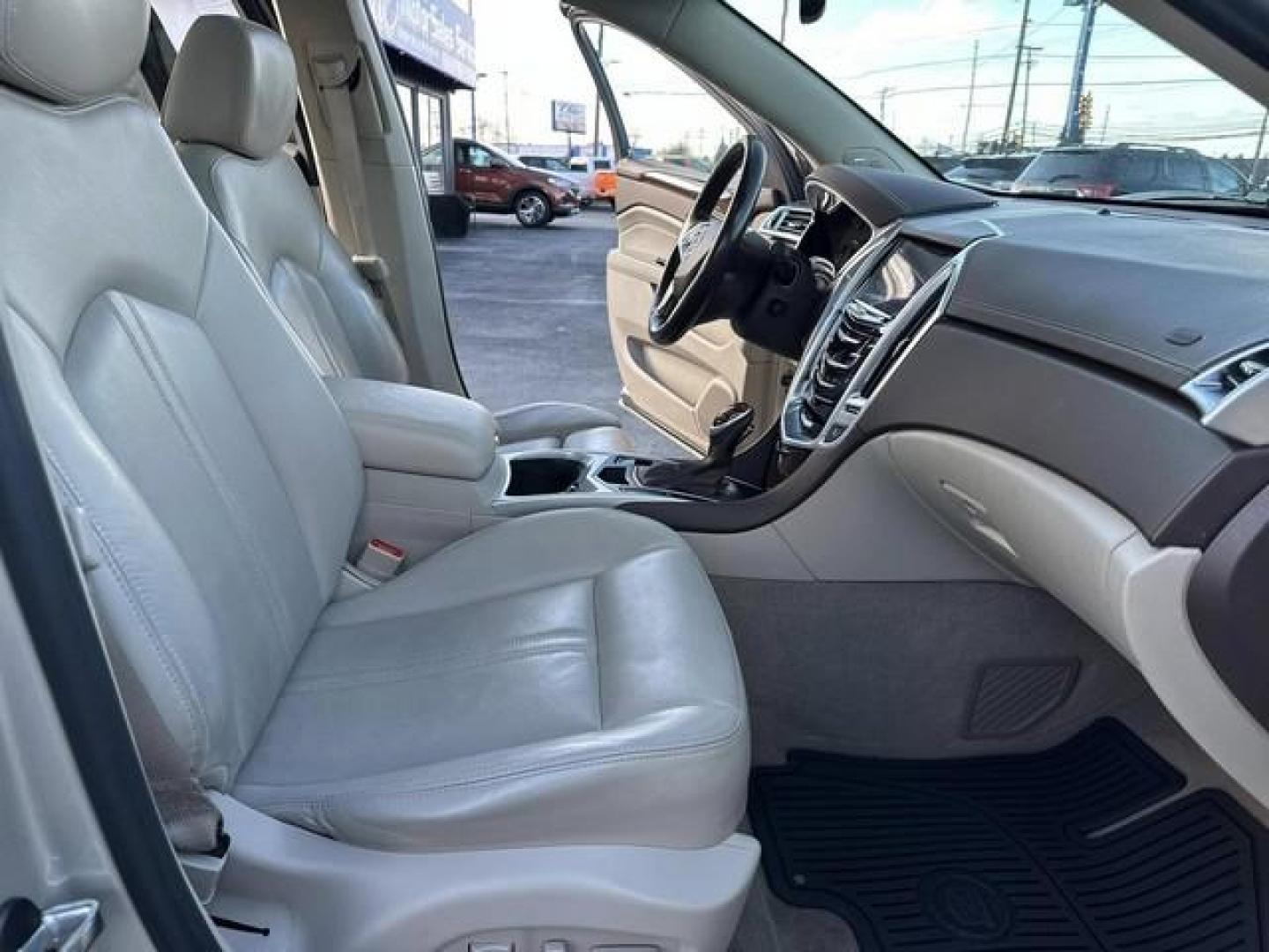 2015 TAN CADILLAC SRX (3GYFNBE39FS) with an V6,3.6L(217 CID),DOHC engine, AUTOMATIC transmission, located at 14600 Frazho Road, Warren, MI, 48089, (586) 776-3400, 42.485996, -82.974220 - Photo#14