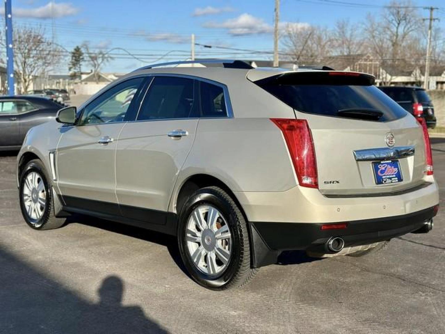 2015 TAN CADILLAC SRX (3GYFNBE39FS) with an V6,3.6L(217 CID),DOHC engine, AUTOMATIC transmission, located at 14600 Frazho Road, Warren, MI, 48089, (586) 776-3400, 42.485996, -82.974220 - Photo#2