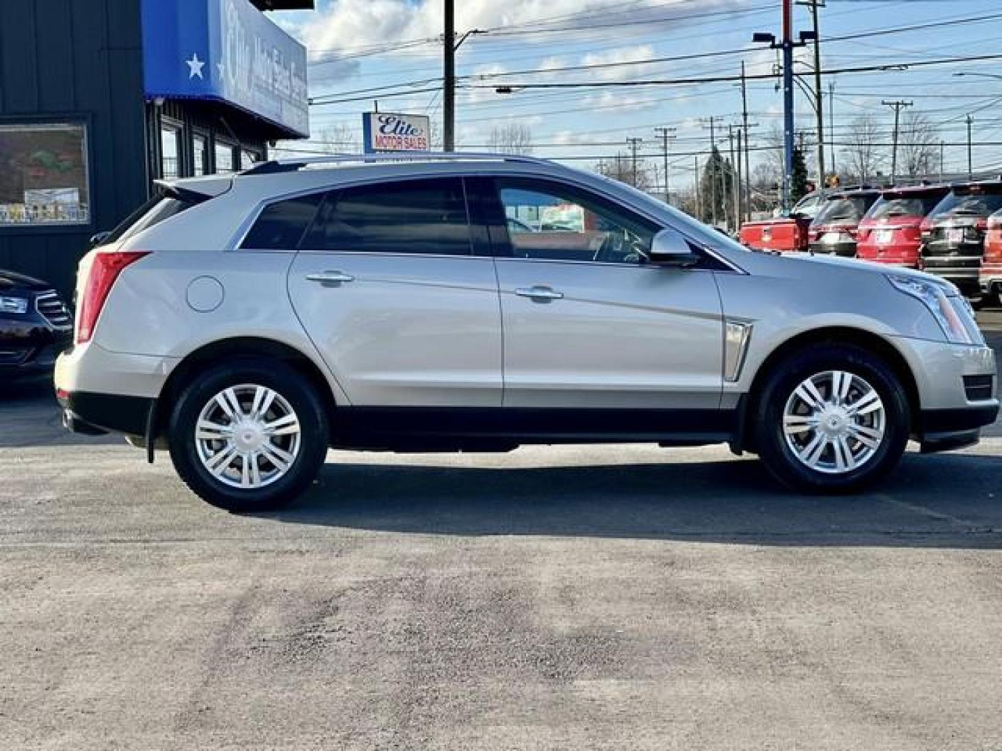 2015 TAN CADILLAC SRX (3GYFNBE39FS) with an V6,3.6L(217 CID),DOHC engine, AUTOMATIC transmission, located at 14600 Frazho Road, Warren, MI, 48089, (586) 776-3400, 42.485996, -82.974220 - Photo#4