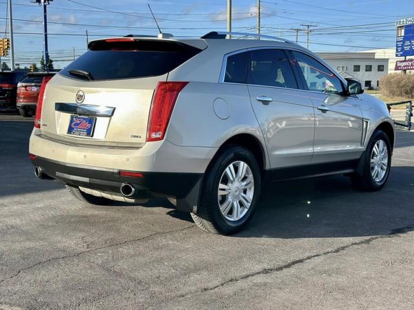 2015 TAN CADILLAC SRX (3GYFNBE39FS) with an V6,3.6L(217 CID),DOHC engine, AUTOMATIC transmission, located at 14600 Frazho Road, Warren, MI, 48089, (586) 776-3400, 42.485996, -82.974220 - Photo#5